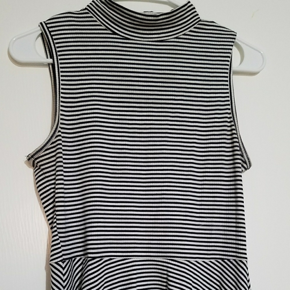 Black and white striped peplum tank top